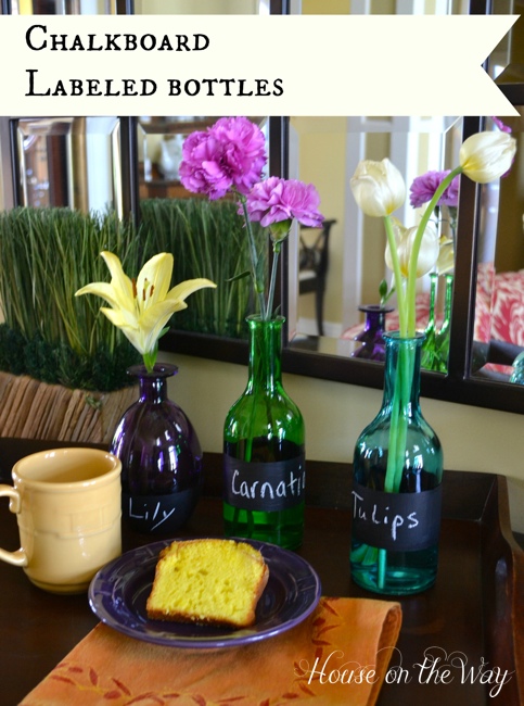 chalkboard labeled glass bottles, chalkboard paint, crafts, Create a mother s day breakfast in bed with flowers in bottles that mom can use later