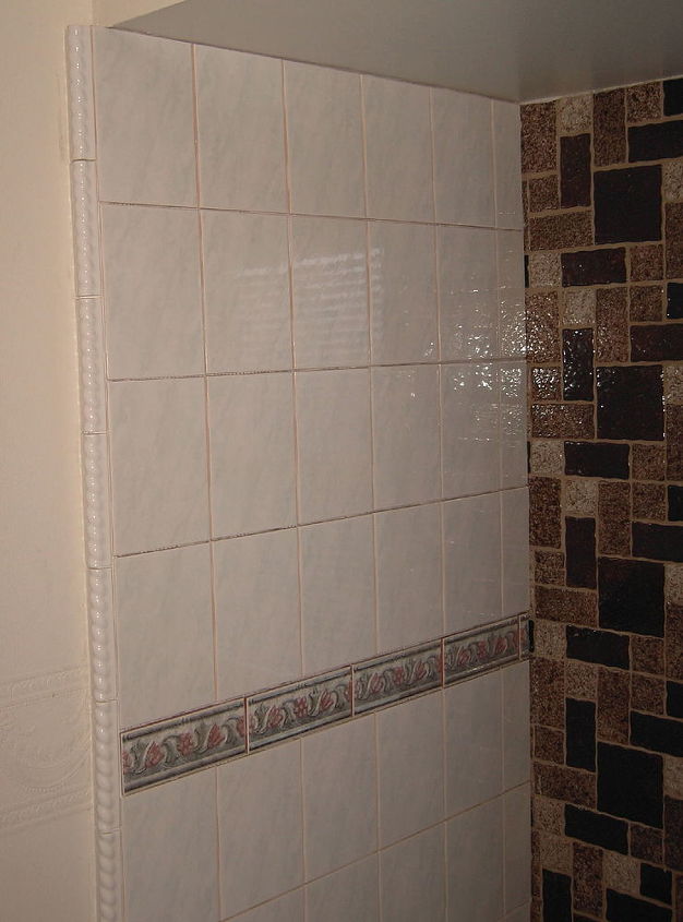 my house originally had ugly brown speckled tile on guest bath tub surround i found, bathroom ideas, curb appeal, outdoor living, tiling, My house originally had UGLY brown speckled tile on guest bath tub surround I found the proper mastic to lay NEW beautiful tile right on top of the old I used a rope type tile to conceal the edges Spectacular