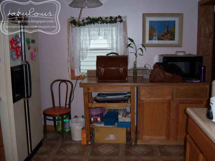our punk rock kitchen before amp after, home decor, kitchen design, The side of the kitchen by the entrance with some not awesome crap shoved into the corner