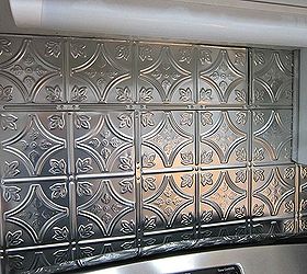 kitchen makeover, home decor, kitchen backsplash, kitchen design, Tin ceiling tiles were used for the backsplash They were so easy to work with You cut them using tin snips and apply to wall with liquid nails