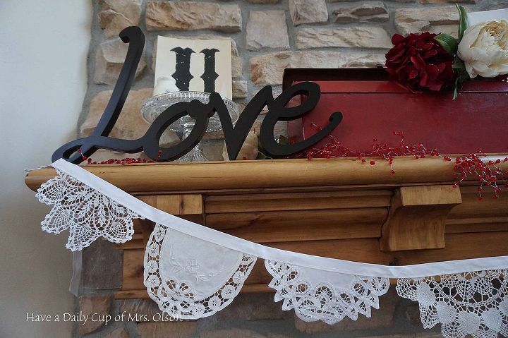 create an easy and fun doily banner, crafts, fireplaces mantels, seasonal holiday decor, valentines day ideas, 1 Iron and starch doilies so that they are reasonably stiff enough to stop fraying when cut in half