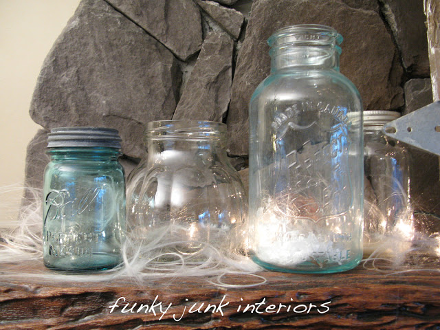 the many quirky uses of a mason jar, mason jars, repurposing upcycling, The jars are especially beautiful if you add faux snow with white mini lights behind them I call these safe candles and they positively glow full picture on the blog