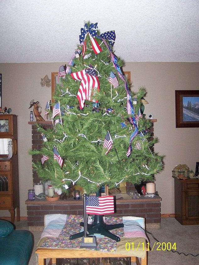 holiday trees 2013, easter decorations, patriotic decor ideas, seasonal holiday d cor, Was getting ready for carpet shampooer to come and put the tree on top of coffee table Couldn t decide with one of these pictures I liked best so posting both Flag below the tree plays four patriotic songs