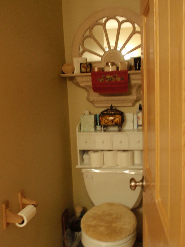 q all suggestions to our master bath please, bathroom ideas, home decor, painted furniture, Our toilet area is at least 5 feet back behind the bathrm door Too dark narrow How to put up some lighting here Using mirror to reflect some light there currently