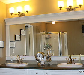 how to upgrade your builder grade mirror frame it cost us around 30, crafts, Our easy framed mirror