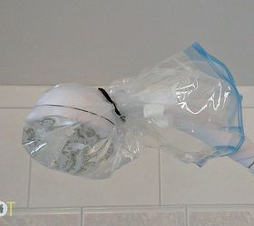 4 ways to clean the shower and keep it clean, bathroom ideas, cleaning tips, Another age old trick is to wrap a shower head in a bag of vinegar and let it set overnight It should remove mineral buildup and allow for better flow