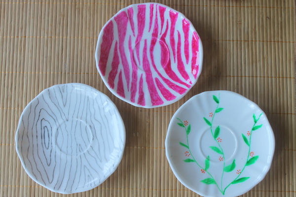 using glass markers to paint on plates think pink, crafts, flowers, I think my favorite is the pink zebra or maybe the grey faux bois It is so hard to decide