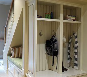 oftentimes the space under the stairs is used for storage the creative designers at, home decor, Perpendicular to the under stairs storage nook near the garage we created 2 attractive lockers to keep the kids stuff organized regardless of the season