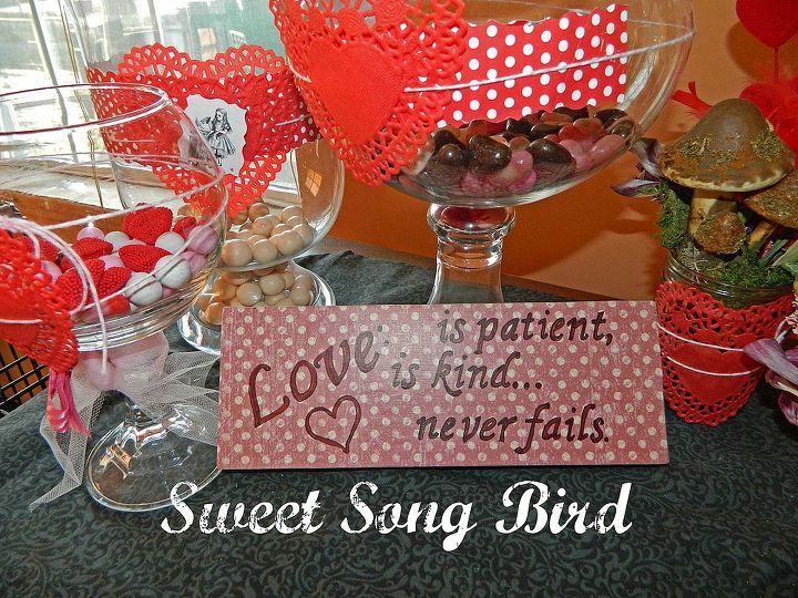 love never fails block valentine s day decor, crafts, decoupage, seasonal holiday decor, valentines day ideas, Try filling some Apothecary jars with Valentine s Day Candy along with a sweet Love block and you got yourself some sweet pun intended decor