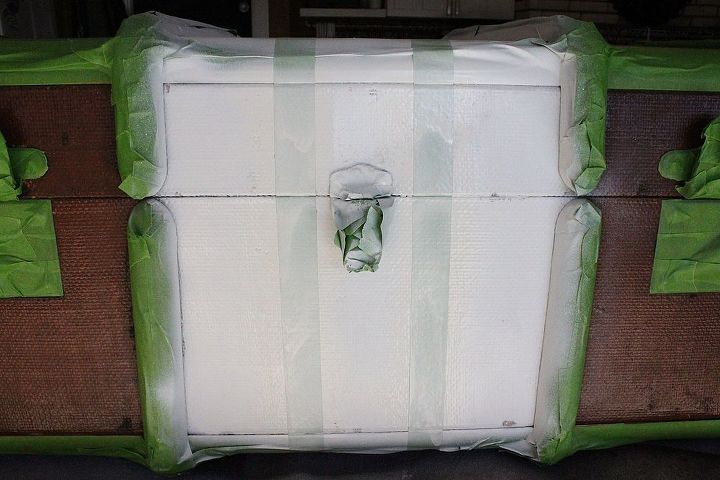 new look for an old steamer trunk, crafts, decoupage, painted furniture, I wrapped the center wiht 2 strips of frog tape and sprayed white over them to minimize bleed through