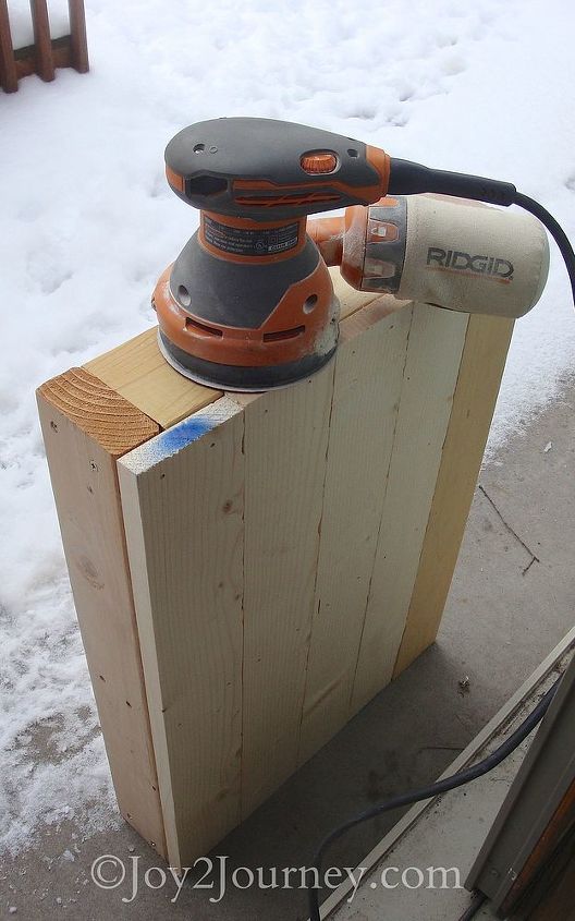 building an easy step stool platform, crafts, woodworking projects, Sanding in the snow Brrr