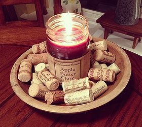 fall decor ideas, seasonal holiday decor, It s the simplistic decor I love like this apple butter candle coupled with some wine corks in a gorgeous blue antique bowl