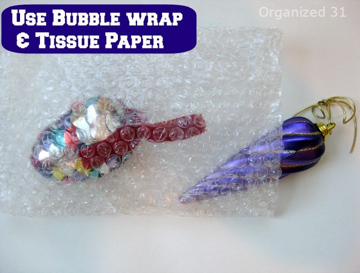 how to pack decorations, cleaning tips, seasonal holiday decor, Use repurposed bubble wrap and tissue paper to protect delicate ornaments Also keep and use original boxes and packaging when possible