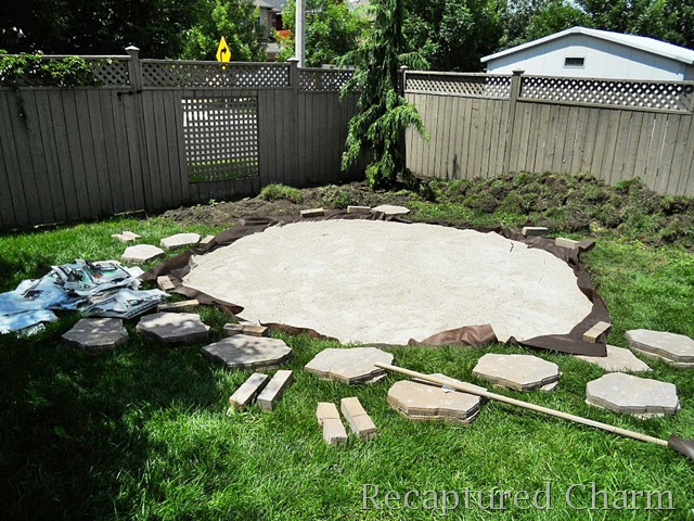 fire pit patio, outdoor living, patio, After the circle is cut and the grass soil removed we laid down some landscapers cloth The cloth was then covered in limestone screening