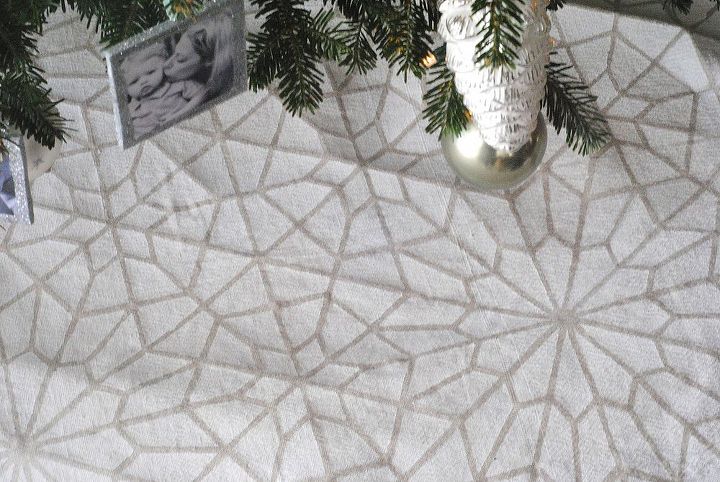 how to make a stenciled tree skirt from a dropcloth, christmas decorations, crafts, painting, seasonal holiday decor, Soon you ll have a beautiful stenciled design Let it dry and cut a straight line HALFWAY through the circle to make your slit for the tree