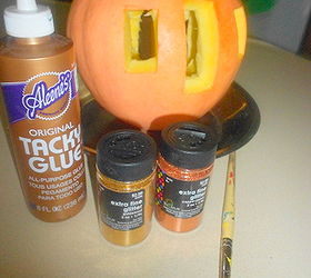 how to make a cinderella pumpkin coach, crafts, gardening, seasonal holiday decor, I started with a medium sized pumpkin and carved a door and two rectangular windows in it Then I made a wash with 1 part glue to 1 part water
