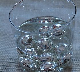 natural christmas holiday table centerpiece, christmas decorations, seasonal holiday decor, Add some shiny silver balls to reflect the light Fill the balls with water so they sink in your glass container