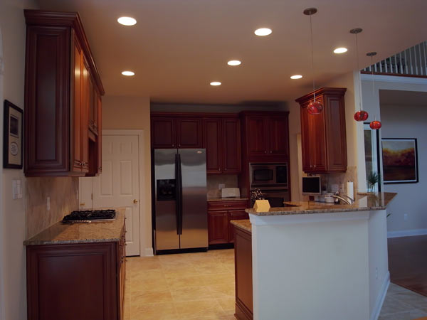 before after light layers in a kitchen, kitchen design, lighting, Here we illuminate the ceiling with recessed cans