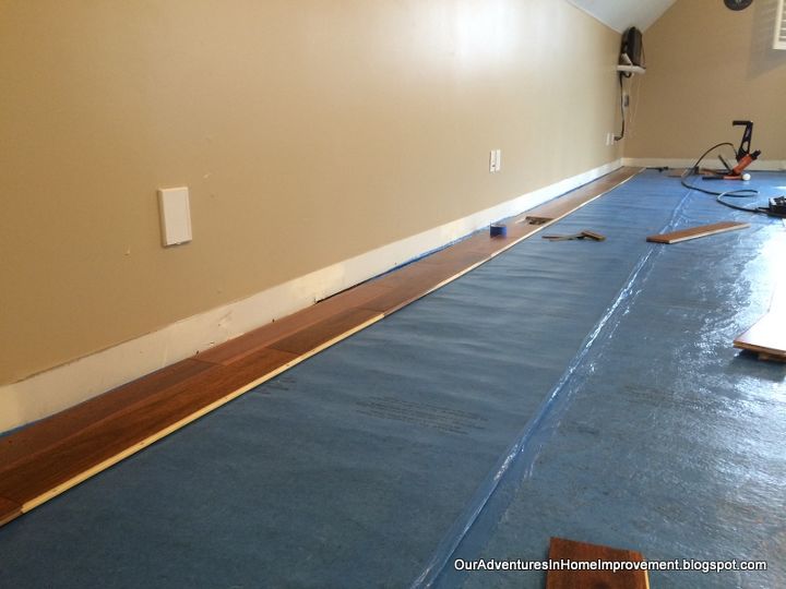 installing a new wood floor, diy, flooring, hardwood floors, woodworking projects, The first two of forty rows