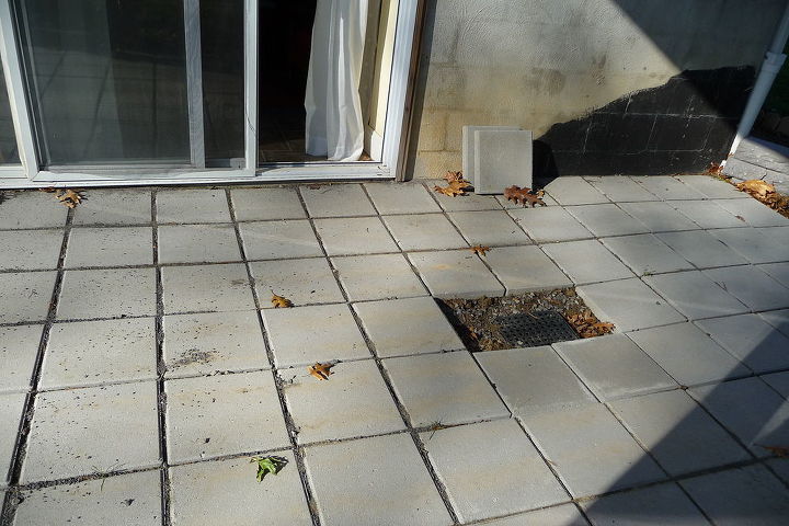 q how to finish this drainage grating problem at back of house, concrete masonry, home maintenance repairs, patio, plumbing