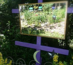 whimsical garden ideas, gardening, I use a lot of mirrors in my gardens They reflect the solar lights at night and the gardens by day I also silicone mirror pieces on my trees to create the same effect