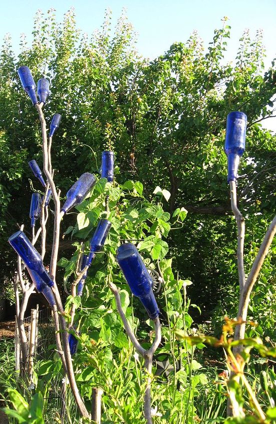 another bottle tree idea, gardening, repurposing upcycling, Branches started as fence posts