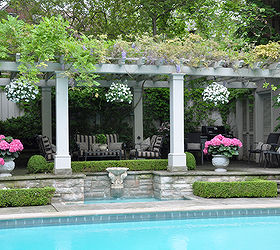 garden tour a poolside garden in rosedale ontario, flowers, gardening, outdoor living, pool designs, Set above the pool is a large vine covered pergola Now wouldn t this be the perfect spot to relax on a lazy summer afternoon