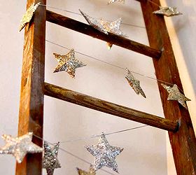 german glitter glass christmas star garland, christmas decorations, seasonal holiday decor, I strung the stars on silver elastic cording
