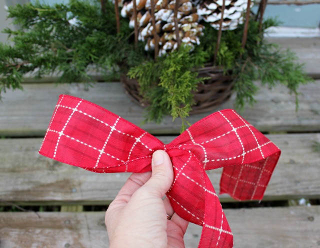 how to make a bow for a christmas tree, christmas decorations, crafts, seasonal holiday decor, Make a loop and bring back to the first twist and twist