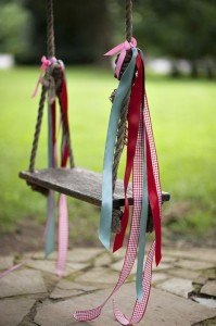 how to create a colorful and family friendly backyard, gardening, outdoor living, We have the perfect tree for an outdoor swing With a piece of sanded and possibly painted upcycled wood rope and ribbon all of the kids can enjoy this peaceful and beautiful swing in the yard