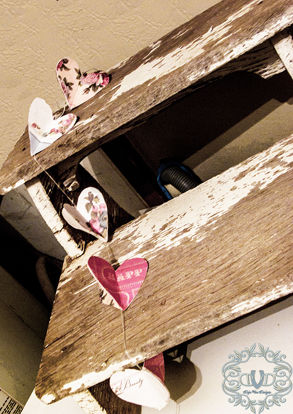 delicate 3 d heart garland, crafts, seasonal holiday decor, I even love mine just draped across this chippy old stool