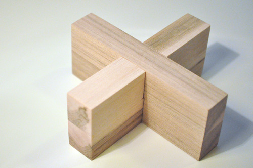 a fun wooden puzzle, crafts, woodworking projects, Here s how the puzzle looks completely assembled Can you get the two sections apart