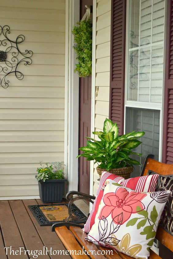 front porch makeover, decks, flowers, home decor, porches, But it needed some decor and function Added a bench some decor and now it is inviting and we enjoy it much more