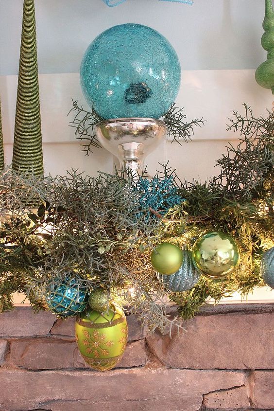 our christmas mantle 2012, christmas decorations, fireplaces mantels, living room ideas, seasonal holiday decor, wreaths, This pretty glass ornament is new this year from TJMaxx