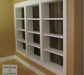 built in bookcases featuring re claimed pine flooring, home decor, shelving ideas, storage ideas, We built the side panels and shelves with pre primed lumber and added the re claimed pine flooring for the back
