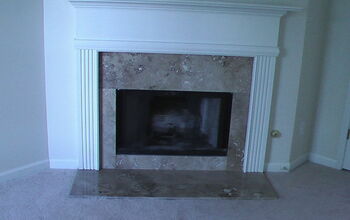 Marbeling over brick fireplace in  great room