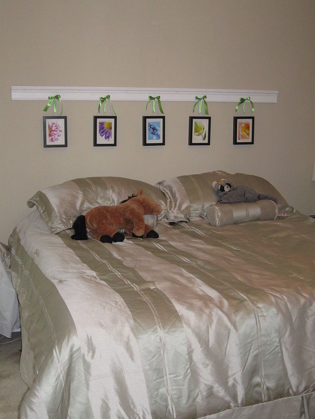 quick and easy headboard made of molding and picture frames with photo cards from, home decor, Quick and easy headboard made of molding and picture frames with photo cards from Ikea