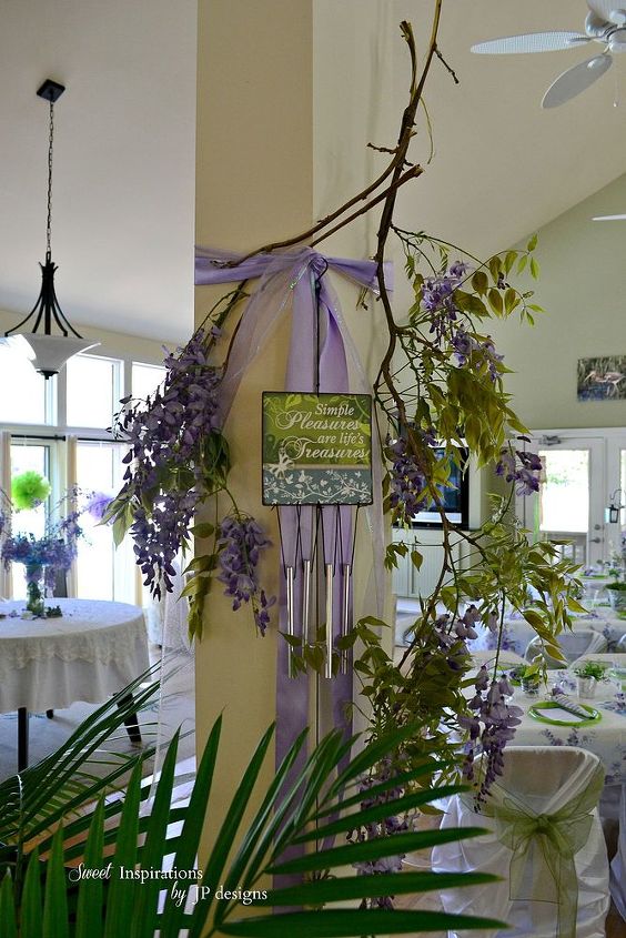spring dinner soiree and decor for 30 guests, seasonal holiday decor, A column decorated with wisteria
