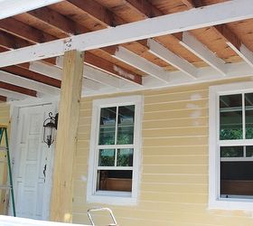 what a difference a good primer makes, curb appeal, diy, home maintenance repairs, painting, more front porch progress with white primer to hide the wood knots