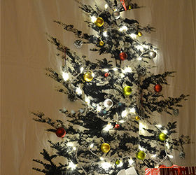diy christmas tree ikea hack, christmas decorations, seasonal holiday decor, IKEA s LIAMARIA all dressed up for the holidays with mini LED lights and ornaments