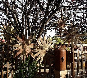 garden furniture from repurposed wood, outdoor furniture, outdoor living, painted furniture, repurposing upcycling, rustic furniture, woodworking projects, Reclaimed redwood decking has become stars hanging from the trees