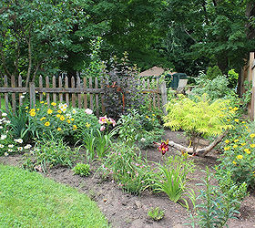 my secret garden, flowers, gardening, perennials, This spring we dug up a triangular area and filled it with shrubs roses and perennials