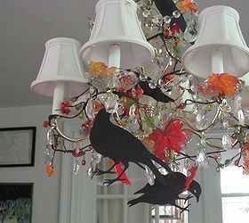 black crows autumn decorating, seasonal holiday decor, I decorated my chandelier with fake autumn leaves and then added the black crows Love em It makes the chandelier look alive with birds