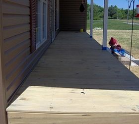 sealing your wood deck for years of enjoyment, decks, home maintenance repairs, how to, Make sure everything is off the deck protect everything you don t want sealer on We simply used painters tape around the post for the vinyl we used a paper masker not shown