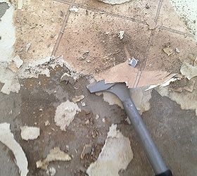 storage room, concrete masonry, flooring, home maintenance repairs, how to, I used an iron to help loosen the glue but still ended up using a blade scraper