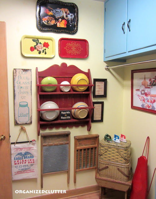 an organized clutter home tour, home decor, Laundry room washboards irons and kitsch