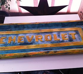 recycled truck tailgate to wall art, AFTER A couple of hours with some acrylic paint and glossy sealer turned it into a cool piece of wall art