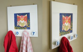 Create a kids' coat hanger out of an old cabinet door!