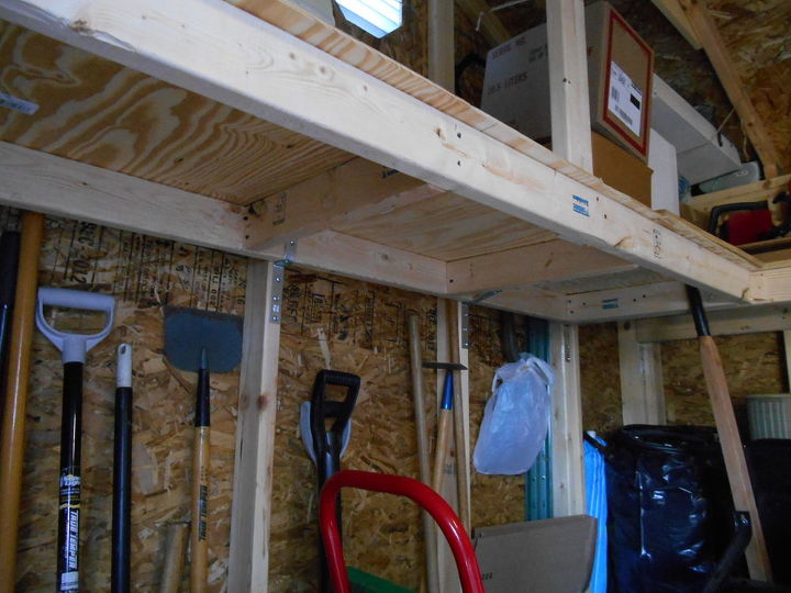 pete felt he needed and additional shelf in his new shed, basement ideas, outdoor living, shelving ideas, woodworking projects, This shelf is built to last he took his time The shelf that came with the purchase of the shed is shoddy half the size
