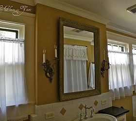 is a large bathroom possible in an old house yes it is, bathroom ideas, home decor, Large gilded mirror and sconces add old house charm to a modern bathroom